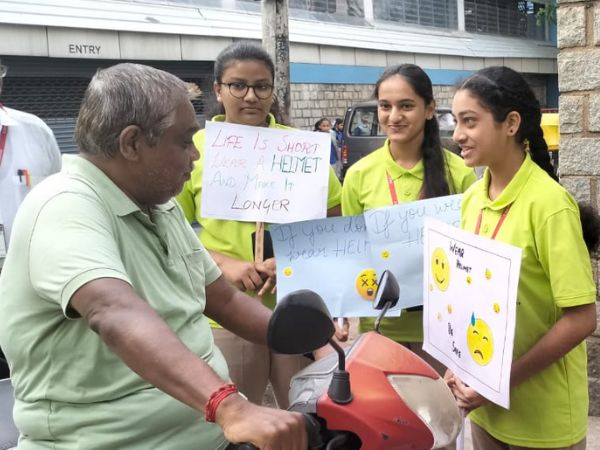 CREATING AWARENESS ABOUT WEARING HELMET 3